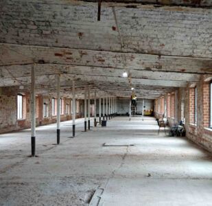 6 Northcot Shrewsbury Flaxmill Maltings Sustainability category Brickwork detaling repairs in progress Photo credit David Jerred Miles DSC00622